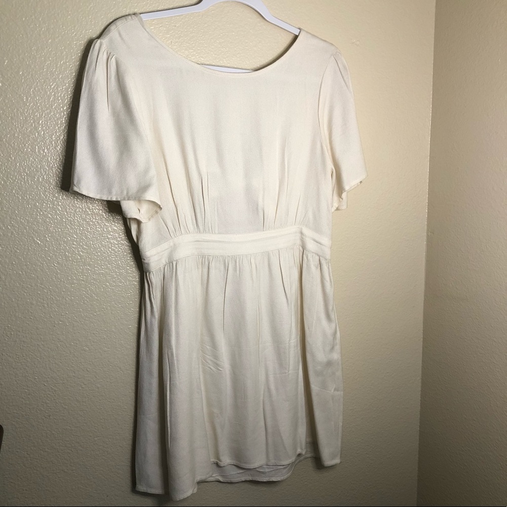Cream colored boutique mini dress